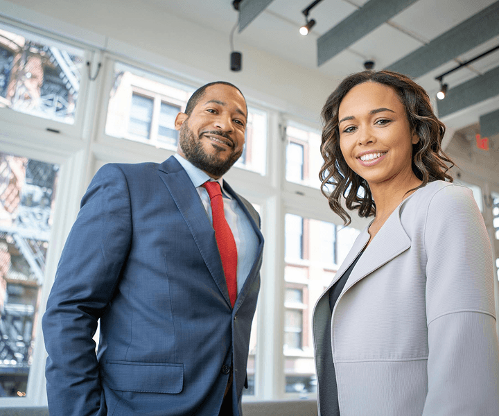 Professional business partners - man and woman in business attire
